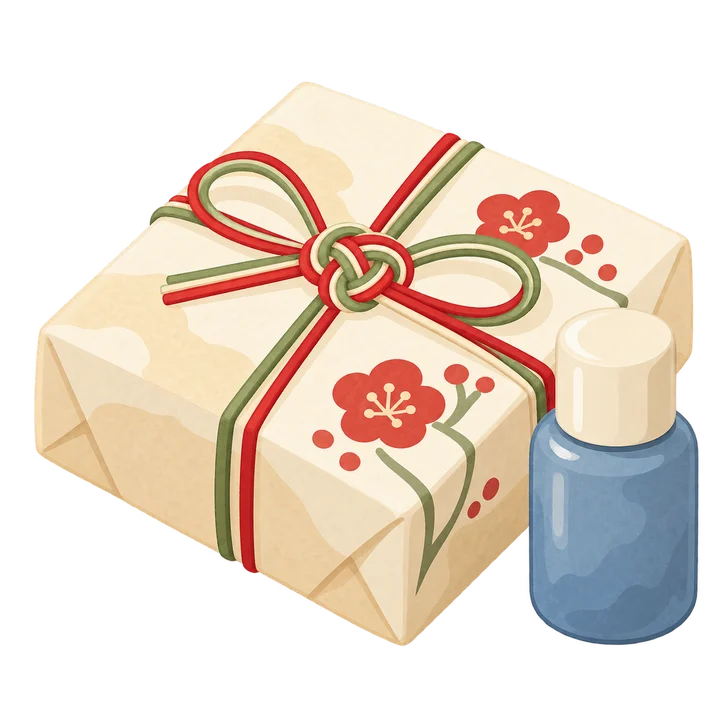 Una confezione regalo chiusa con cordoncino rosso e un flacone cosmetico